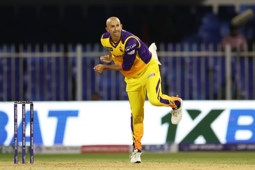 Ashton Agar of Sharjah Warriorz bowls during the match 21 of the DP World International League T20 between the Sharjah Warriorz and the Gulf Giants