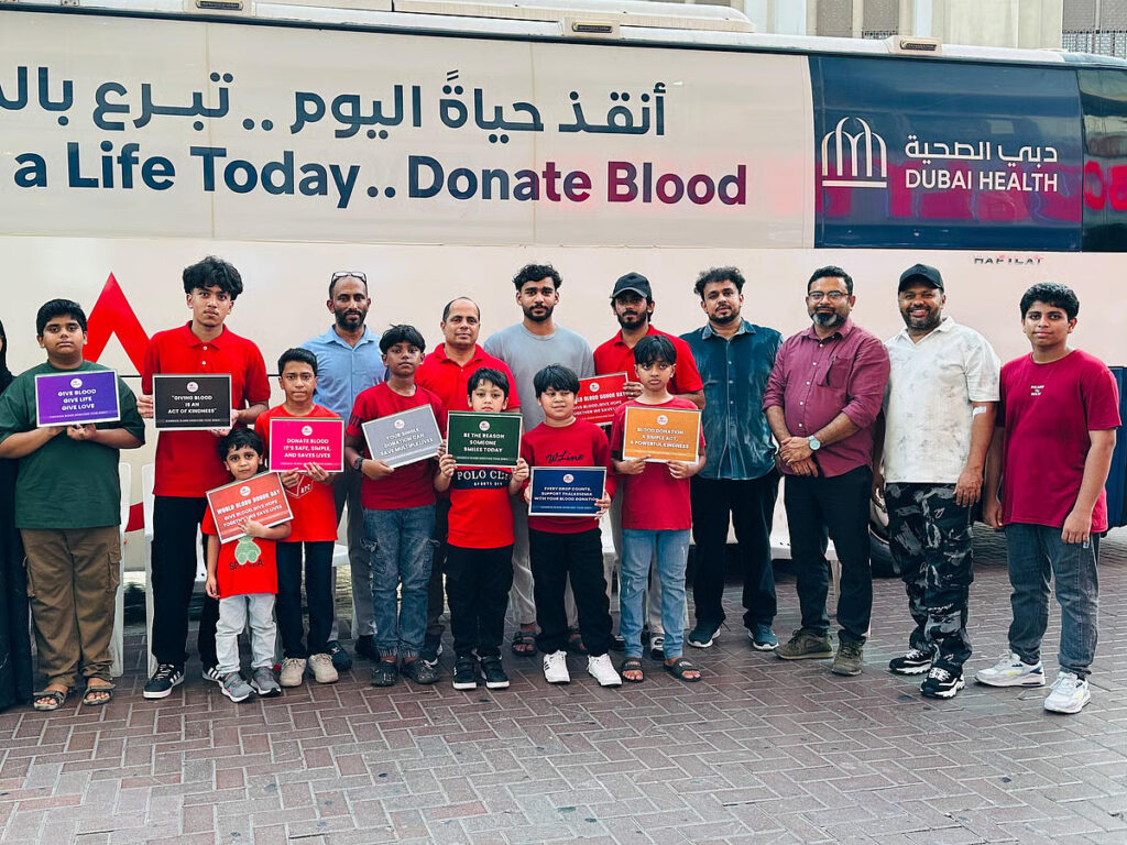 The Kindness Blood Donation Team members with young ambassadors of blood donation during a mobile blood donation drive in Dubai on Friday
